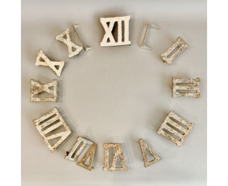 A vintage cast iron Roman numeral 'Clock Golf' garden game set - part-complete, with the missing digits replaced with cut-out