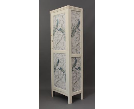 An off-white painted cupboard - the two-panel door and sides pasted with Laura Ashley Belvedere wallpaper. (LWH 61 x 38.5 x 1