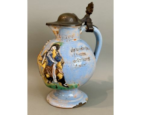 A 19th century German earthenware pewter-mounted stein - of globular baluster form with moulded decoration of a cavalier and 