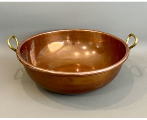 A good quality, heavy gauge copper and brass jam pan - 19th century, with twin brass, copper riveted handles, 41cm diameter p