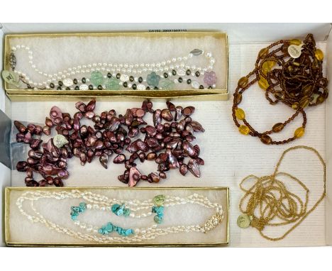 A small group of cultured and freshwater pearl and amber jewellery - comprising a graduated cultured pearl necklace with silv