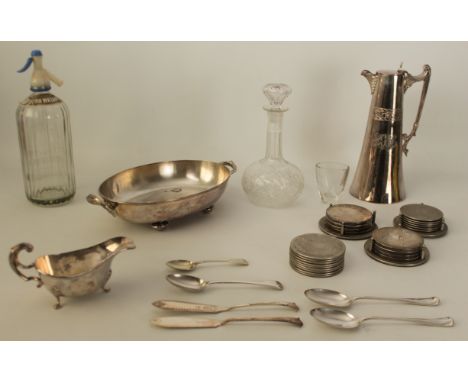 A mixed lot of silver plate and glassware to include&nbsp;four sets of coasters,&nbsp;a sauce boat,&nbsp;a hot water jug, fla