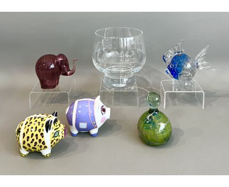 A pair of porcelain piggy banks by Michael Sieger for Ritzenhoff - 10cm long; together with a Mdina style glass paperweight; 