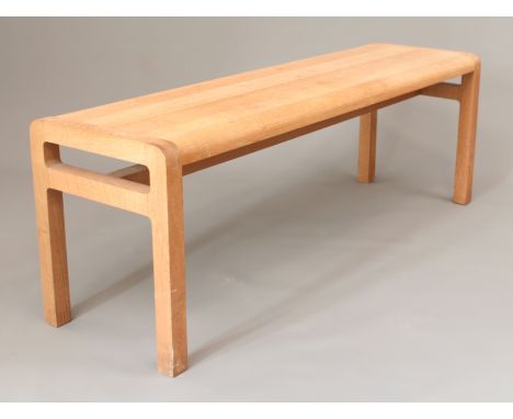 A light oak bench - (LWH 130 x 37.5 x 45cm)