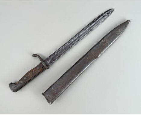 A German bayonet in a metal scabbard (possibly First World War), maker's stamp to the blade, 52cm.