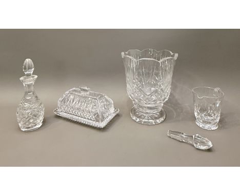 A Waterford butter dish and vase - the butter dish 18cm long; the vase with scalloped rim and heavy circular foot, 19cm high;