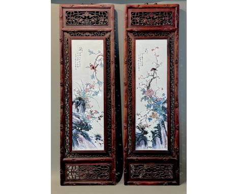 A pair of Chinese porcelain plaques - late 20th century, printed with birds and flowers above rockwork, within pierced and ca