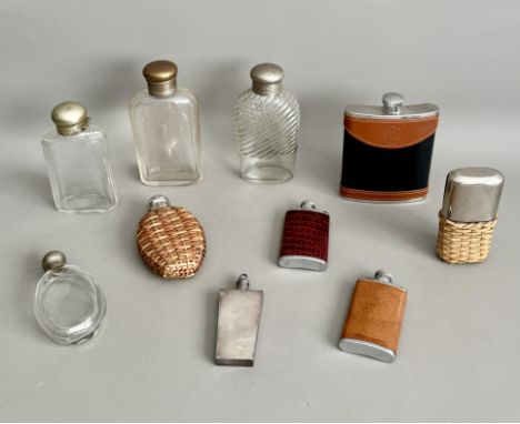 A small collection of vintage and modern spirit flasks - including four cut and moulded glass examples with plated mounts, th