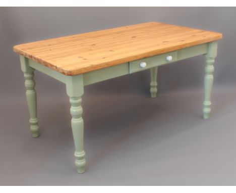 A part-painted pine kitchen table with side drawer - (LWH 150 x 85 x 76cm)