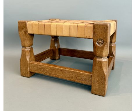 Mouseman and the Yorkshire Critters: an oak and leather topped foot stool by Malcolm Pipes, 'Foxman' - of Fox Furniture, Carl