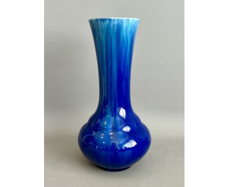 A Royal Lancastrian vase - 1950s, impressed factory marks and shape no 2784, of bottle form with a flared neck, in a streaked