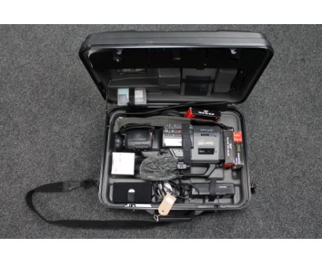 A JVC video camera in case with accessories 