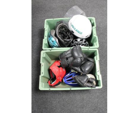 A Metro cricket bag containing cricket accessories to include pads, helmets, cricket balls etc Two plastic crates of ambulanc