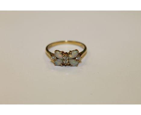 An 18ct gold opal and diamond ring