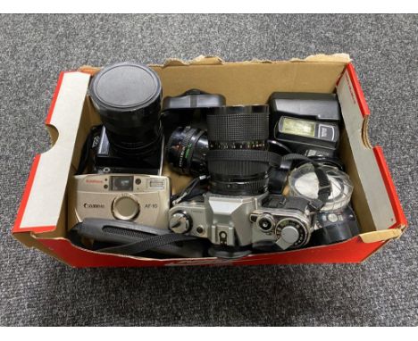 A box of Canon AE-1 camera, Zenit EN camera, Canon AF-10 camera, assorted lens, flashes and filters 