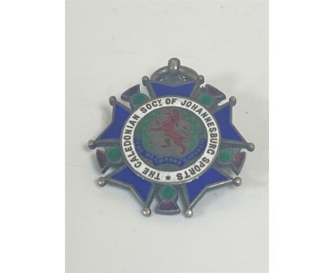 A silver and enamel medal for the Caledonian society of Johannesburg