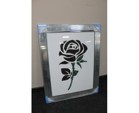 An all glass framed mixed media print of a rose 
