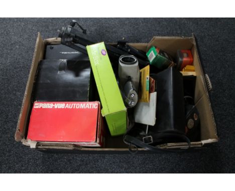 A box of assorted cameras, cine camera, camera accessories, wooden case of camera filters 
