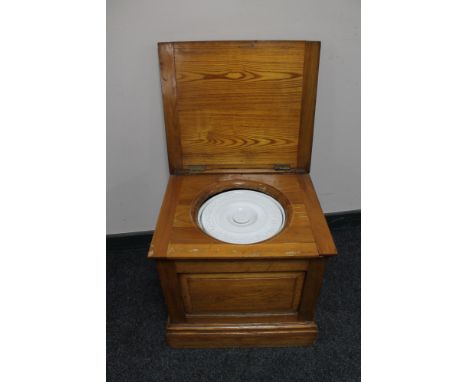 An antique pine commode box 