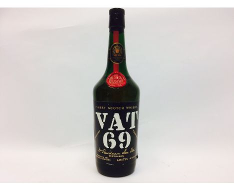 VAT 69
Blended Scotch Whisky
Full sized bottle, no capacity or strength stated. CONDITION REPORT: Fill level high shoulder.