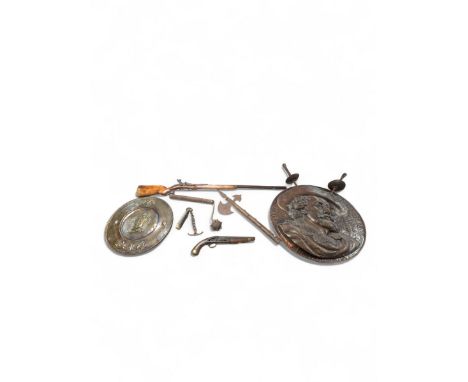 Copper shield and two rapiers, the shield depicting Peter Paul Rubens in relief,  together with a brass Sir Galahad charger, 
