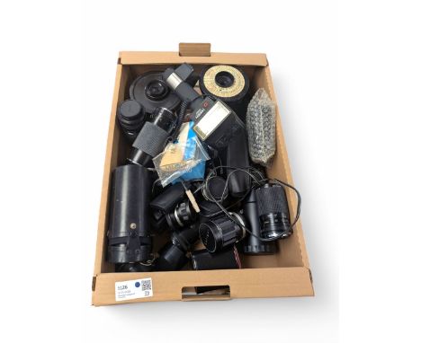 Collection of camera lenses, including Tamron, Praktica, Minolta and Soligor examples