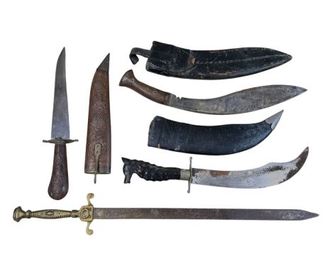 Two Kukri knifes, together with two other daggers 