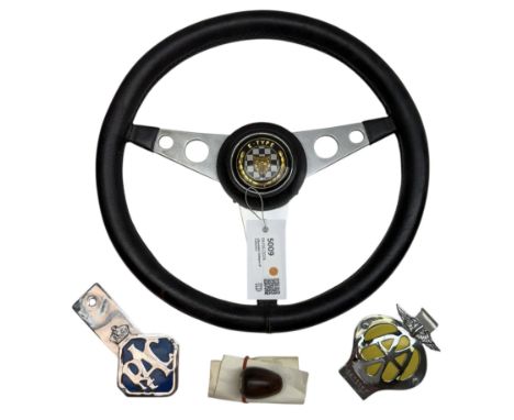 Steering wheel with E-Type Jaguar badge, AA badge, RAC badge and Lotus gearstick top