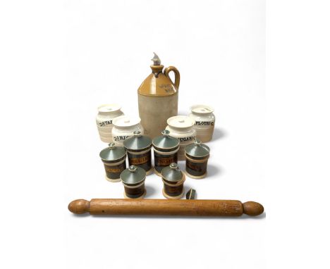 19th century sage green apothecary jars with gilt labels, four white ceramic kitchen jars and a stoneware flaggon marked Whea