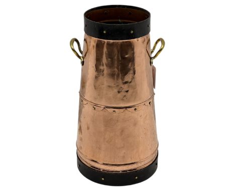 20th century copper milk churn, of tapering cylindrical form with applied brass twin handles and darkened banded rim and base