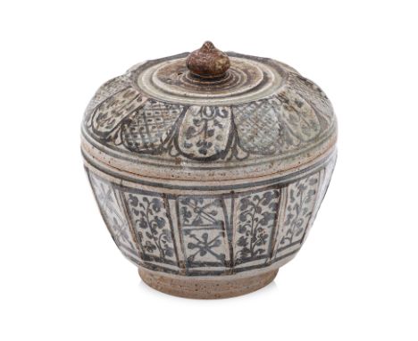 A LARGE THAI BOX AND COVER Sawankhalok, 15th Century, a circular faceted box tapering to a narrow foot, brown underglaze deco