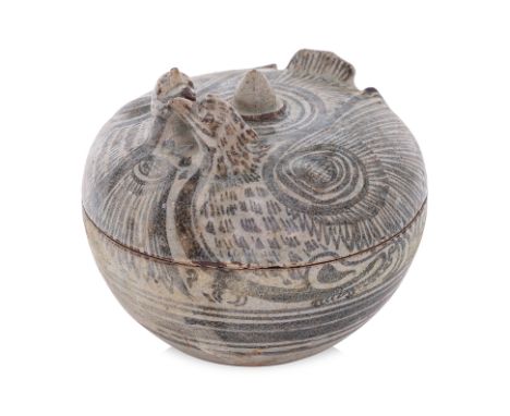A THAI BOX AND TWIN BIRD COVER
Sawankhalok, 15th Century, circular box with cover modelled in the form of two birds, undergla