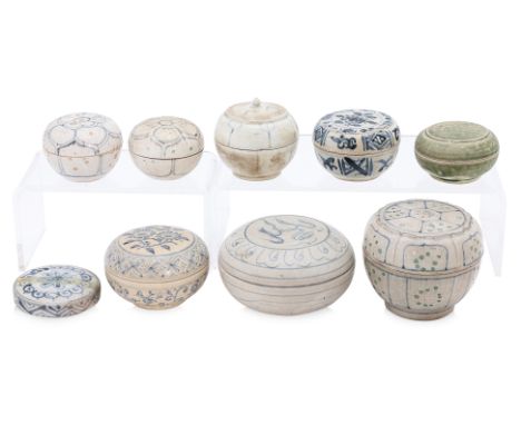 A GROUP OF EIGHT VIETNAMESE BOXES AND COVERS
14th-15th Century, an example with contoured top and painted underglaze blue and