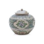A LARGE VIETNAMESE POLYCHROME JAR AND COVER
