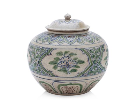 A LARGE VIETNAMESE POLYCHROME JAR AND COVER 15th Century, of baluster form with rounded sides, domed cover with a lotus bud f