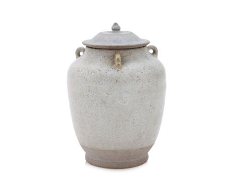A THAI WHITE-GLAZED JAR AND COVER Sawankhalok, 15th Century, an ovoid jar with three lugs to the shoulders, cover glazed with