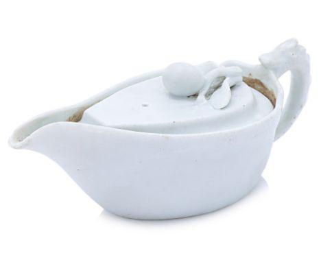 A DEHUA BLANC DE CHINE TEAPOT OR POURING VESSEL AND COVER Delicately potted, of tear drop shape, with chilong moulded handle,