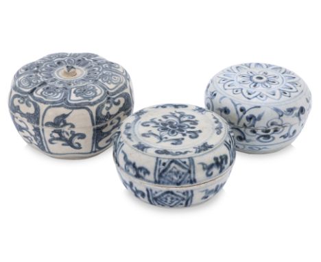 A GROUP OF THREE VIETNAMESE BLUE AND WHITE BOXES AND COVERS
15th Century, a gourd shaped example with contoured sides, densel