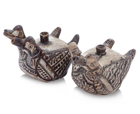 TWO THAI TWIN DUCK WATER DROPPERS
Sawankhalok, 15th Century, modelled as two ducks with stylised feathers incised and painted