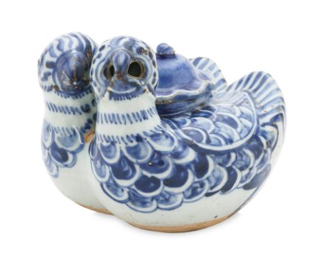 A BLUE AND WHITE TWIN DUCK WATER DROPPER AND COVER Ming Dynasty, circa 16th Century, formed as a pair of conjoined swimming m