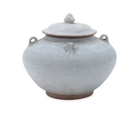 A THAI WHITE GLAZED JAR AND COVER Sawankhalok, 15th Century, a white glazed jar with four lugs and incised rings to shoulders