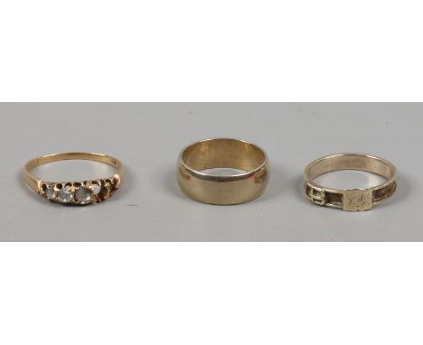 A gold ring set with two rose cut diamonds only partial hallmarks and missing some stones, gross weight 2.6 grams, along with