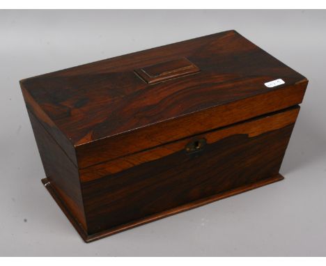 A Regency rosewood tea caddy of sarcophagus form (some faults).