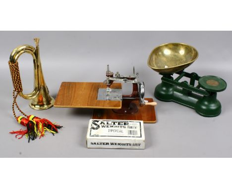 A brass bugle, miniature sewing machine and set of Salter scales and weights.
