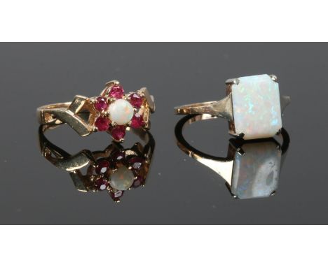 Two ladies 9ct gold rings, one set with an opal, the other an opal and garnet cluster, total gross weight 4.16 grams.