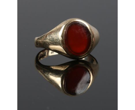 A gents 9 carat gold signet ring set with carnelian, size T, gross weight 4.4 grams.