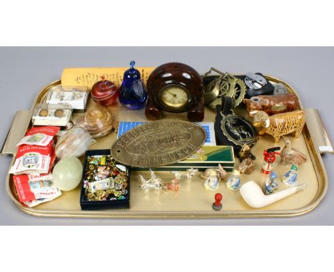 A tray of collectables including an Art Deco rouge marble desk clock, walking stick badges, Wade Whimsies, Ronson lighter, en