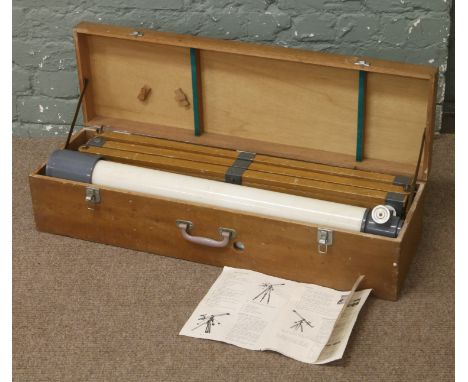 A wooden cased Hilkin terrestrial telescope model number T 705 complete with tripod mount, tripod and instruction manual.