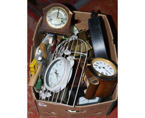 A box of wall clocks, mantle clock etc.