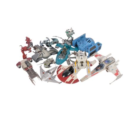 A box of various Star Wars vehicles, including a blue Star Wars Darth Vader TIE fighter, a Darth Maul's Sith Infiltrator figh